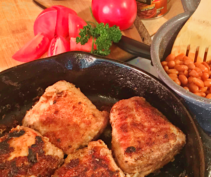 Breaded Pork Loin with Baked Beans and Sliced Tomatoes