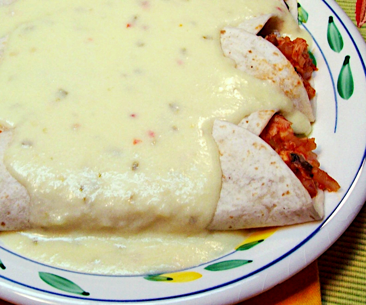 Recipe for Chicken Enchiladas Smothered with Creamy Cheese Sauce